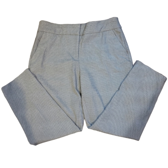 Chico's  slim ankle pants feature a classic houndstooth pattern. - Picture 1 of 12